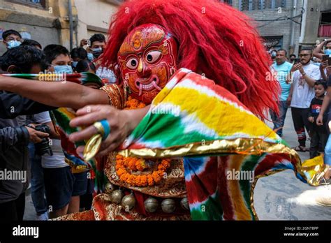 Kathmandu, Nepal - September 2021: The Majipa Lakhey, translated to Manjusri city demon, begins ...