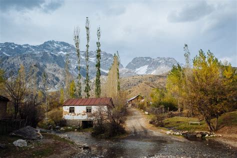 ARSLANBOB, KYRGYZSTAN: View of Arslanbob Village in Southern Kyrgyzstan, with Mountains in the ...