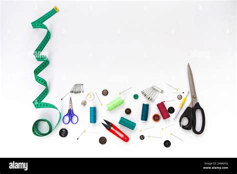 Sewing background. Set of tailoring tools on white background Stock Photo - Alamy