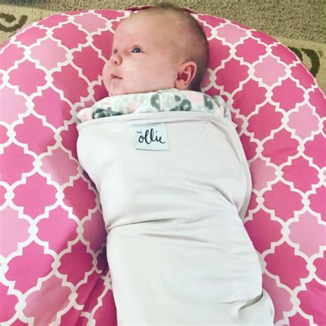 Benefits of Swaddling Baby with The Ollie Swaddle - One Sharp Mama