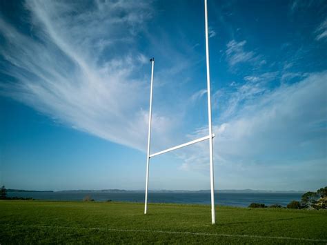 Premium Photo | View of rugby field gate on green grass