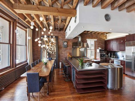 Open Plan Apartment with Exposed Wood Beams and Iron Columns