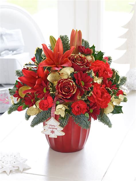 Festive Red and Gold Arrangement | Christmas floral arrangements, Christmas flowers, Online ...