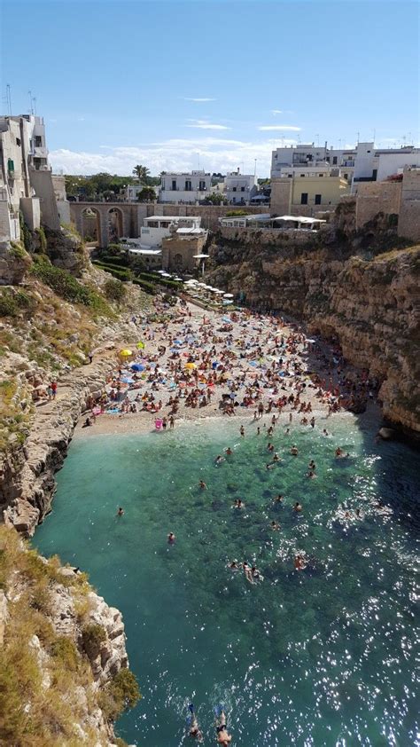 Beautiful beach of Polignano A Mare | Italy road trips, Italian beaches, Italian vacation