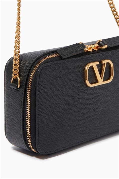 Shop Valentino Black Valentino Garavani VLOGO Signature Wallet on Chain in Grainy Calfskin for ...