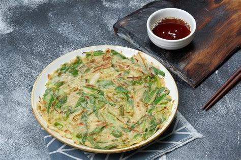 Premium Photo | Homemade Korean Pajeon Scallion pancake or Korean ...