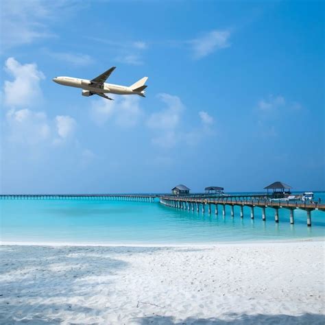 A Plane Flying Over A Sandy Beach In An Unspecified Location, Beach ...