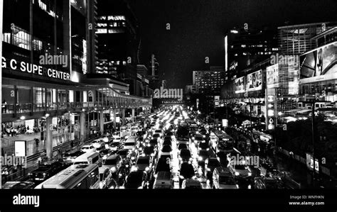 Crowd On City Street At Night Stock Photo - Alamy