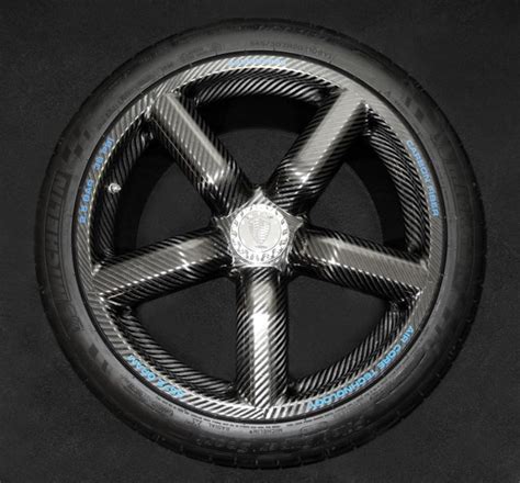 The Koenigsegg Carbon Fiber Wheel is So Light You Can Throw It Around ...