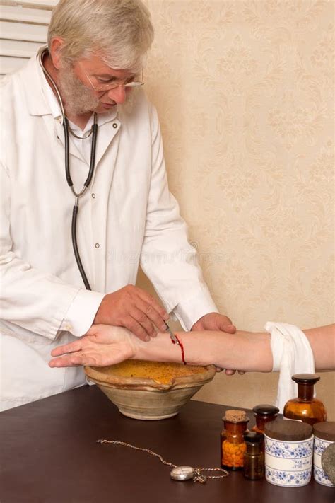 Antique Medical Procedure Of Letting Blood Stock Photos - Image: 33433653