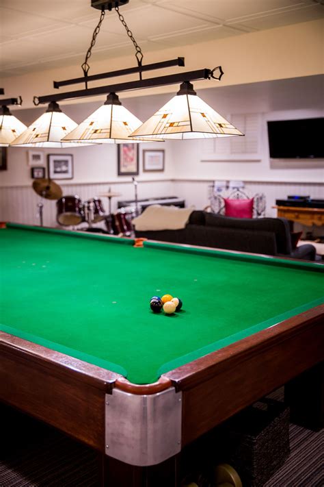 strong lighting over a pool table eliminates shadows | Cool lighting, Foyer lighting fixtures ...