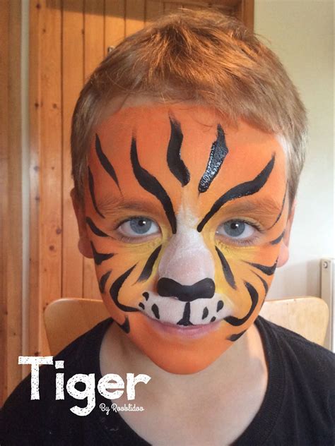 Simple Tiger face painting | Face painting easy, Face painting for boys, Tiger face paints