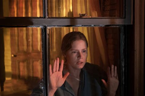 The Woman in the Window [2021]: Netflix Review - Predictable Hitchcockian thriller dwindles ...