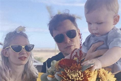 Elon Musk reveals new family photo with Grimes, baby X Æ A-Xii - National | Globalnews.ca