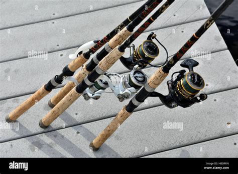 Fishing rods and reels Stock Photo - Alamy