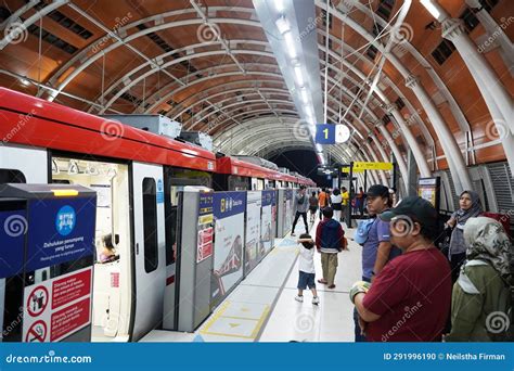 September 28, 2023. Jakarta, Indonesia. LRT Station at Night, Passengers from All Walks of Life ...