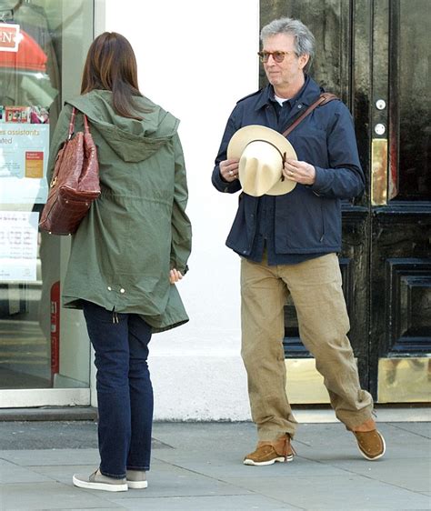 Eric Clapton, 70, and his wife of fifteen years Melia, 39, dress down ...