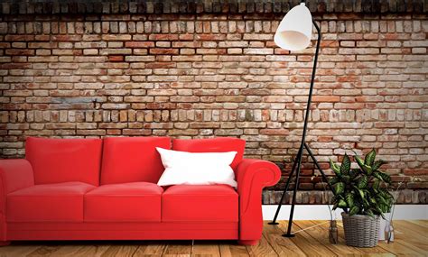 Red sofa and pillow with room brick wall background on wooden floor. 3D ...