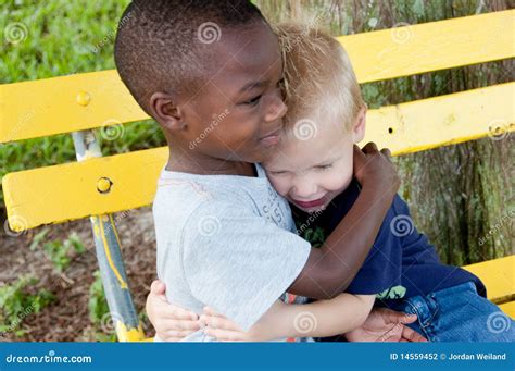 Multiracial Boys Hug Each Other Stock Photography | CartoonDealer.com #14559452