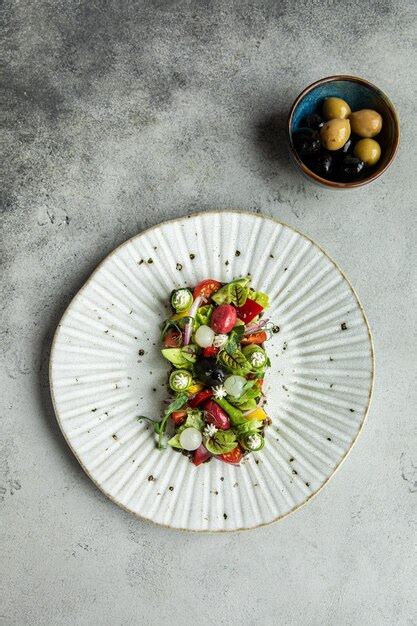 Premium Photo | White plate and fruit salad fresh fruit salad on white background