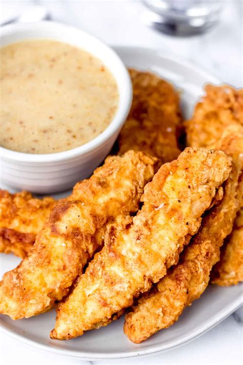 Crispy Pan-Fried Chicken Tenders - Delicious Little Bites