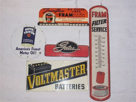 Bonhams : A lot of five original service station advertising signs,