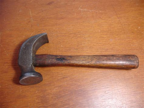 Antique hammer. Im wondering how old it is,what it was used for and rarity? Please help ...