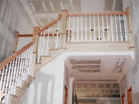 Long Island – Mixed Circular staircases (wood) – Old World Designs Stairs and Railings