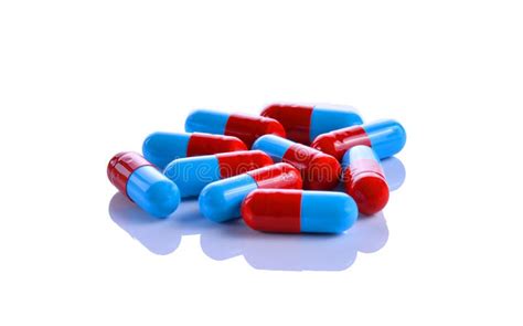 Red and blue capsules stock image. Image of closeup, pills - 65132841