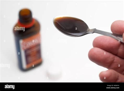 Spoonful of medicine lifted on a 5 ml teaspoon Stock Photo, Royalty Free Image: 12100830 - Alamy