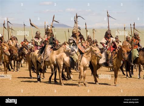 Mongolian warriors on horses armed with spears mustering for battle ...