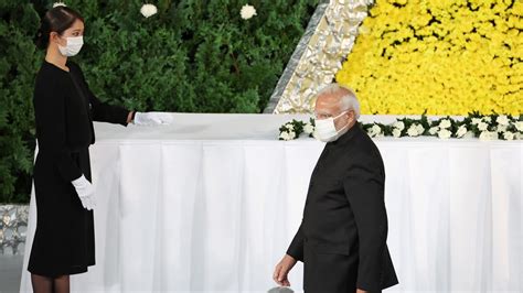 Watch: PM Modi leaves flowers on ex-Japan Shinzo Abe's altar in final farewell | World News ...