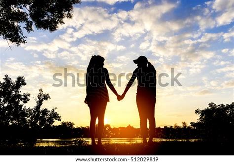 Teenage Sisters Holding Hands Silhouettes Sunset Stock Photo 512029819 | Shutterstock