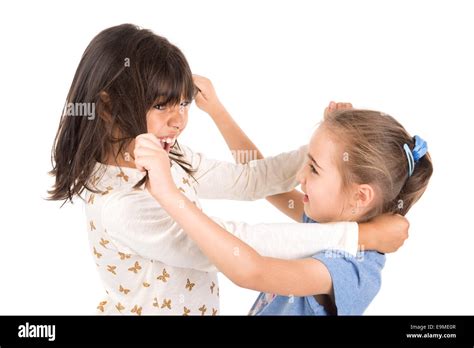 Young girls fighting, pulling hairs isolated in white Stock Photo ...