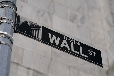 Stocks end mixed after another wobbly day on Wall Street - The Columbian