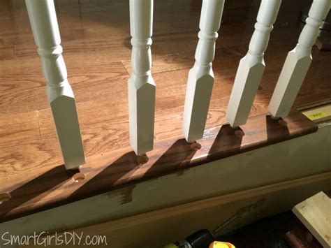 How to install spindles on your indoor staircase | Installing hardwood floors, Split foyer ...