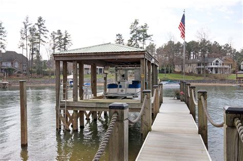 Covered Docks | Lakefront homes, Boat dock, House boat