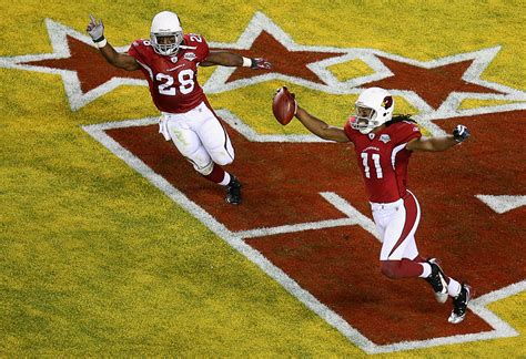 Pitufos Navidad: larry fitzgerald catches