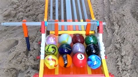 Watch Marbles Race (With Pro Commentary) | Mental Floss