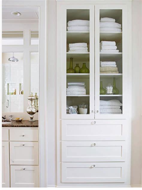 Center cupboard to match detail of vanities. Solid doors, not glass ...