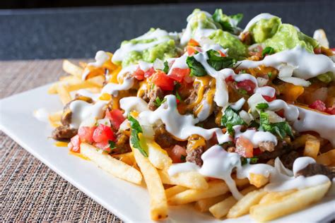 Carne Asada Fries: a beefy crowd-pleasing Cali-Mex dish - Glutto Digest