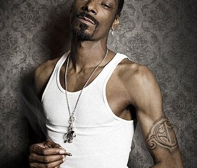 Snoop Dogg’s 6 Tattoos & Their Meanings - Body Art Guru