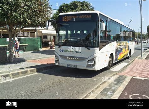 dh PUERTO DEL CARMEN LANZAROTE Arrecife airport bus to Playa Blanca buses travel Stock Photo - Alamy