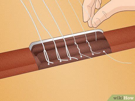 How to Change Classical Guitar Strings (with Pictures) - wikiHow