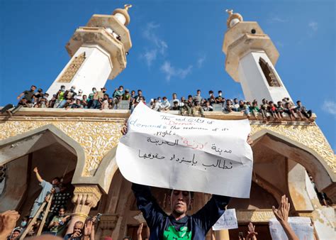 Libyans protest against authorities in flood-hit Derna | Reuters