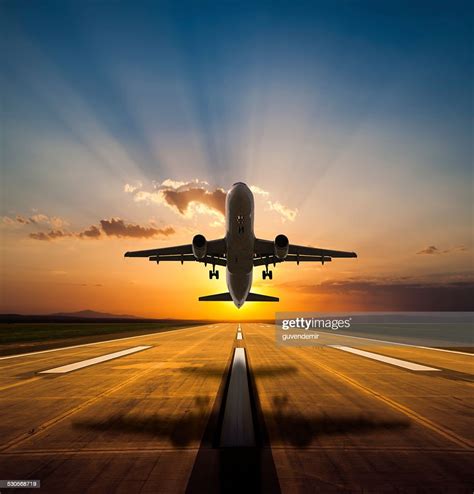 Passenger Airplane Taking Off At Sunset High-Res Stock Photo - Getty Images