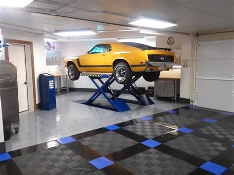 RaceDeck floored home garage with infloor car lift - Flooring - by RaceDeck