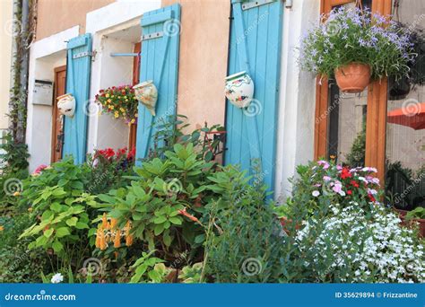 Flowers And Plants Decorating House Exterior. Stock Photo - Image of ...