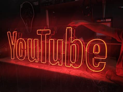 Motion made royalty free youtube logo play icon red flickering neon ...