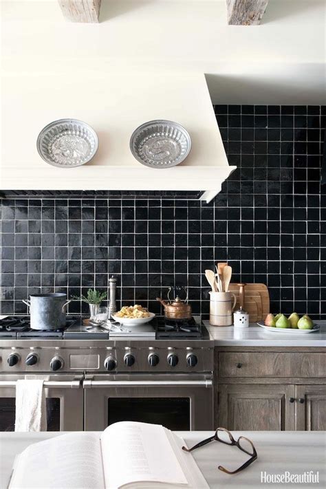 vintage style kitchen, with a wall covered in smooth, square black ...